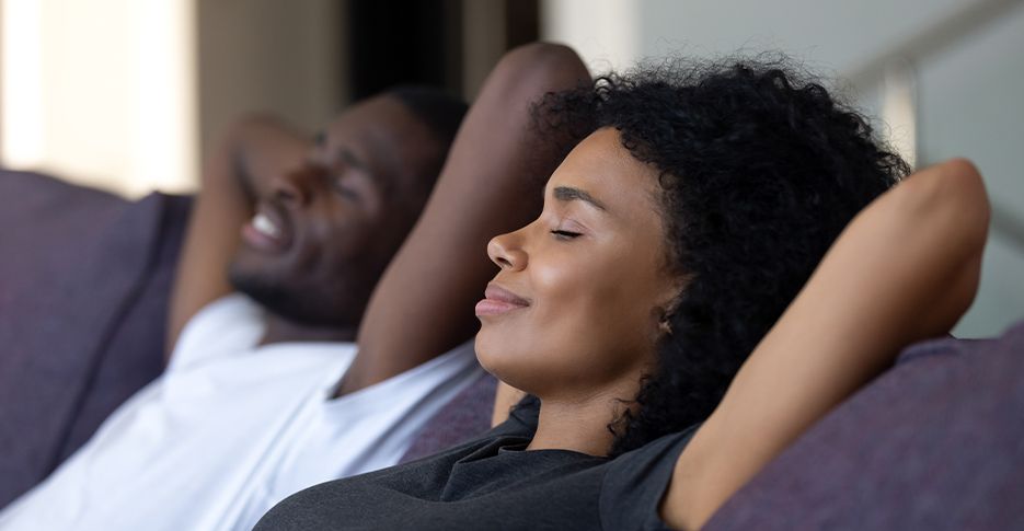 Man and woman sleeping soundly thanks to Herbst oral appliance sleep apnea treatment