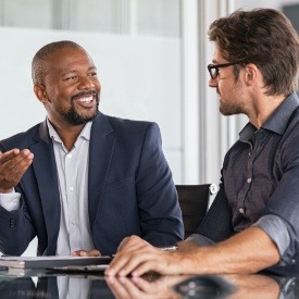 Two men attending a business meeting