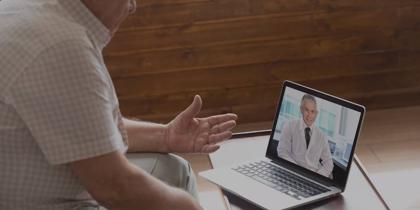 Dentist conducting a virtual sleep apnea consultation with a patient