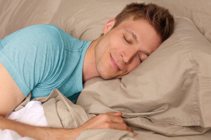 woman sleeping peacefully smiling