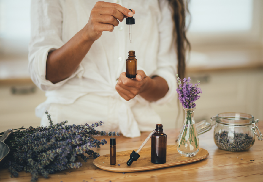 Woman holding essential oils